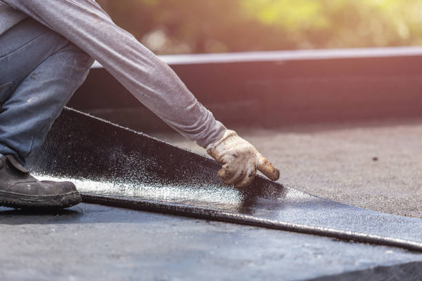 Professional Basement Waterproofing technician working in South Hutchinson, KS